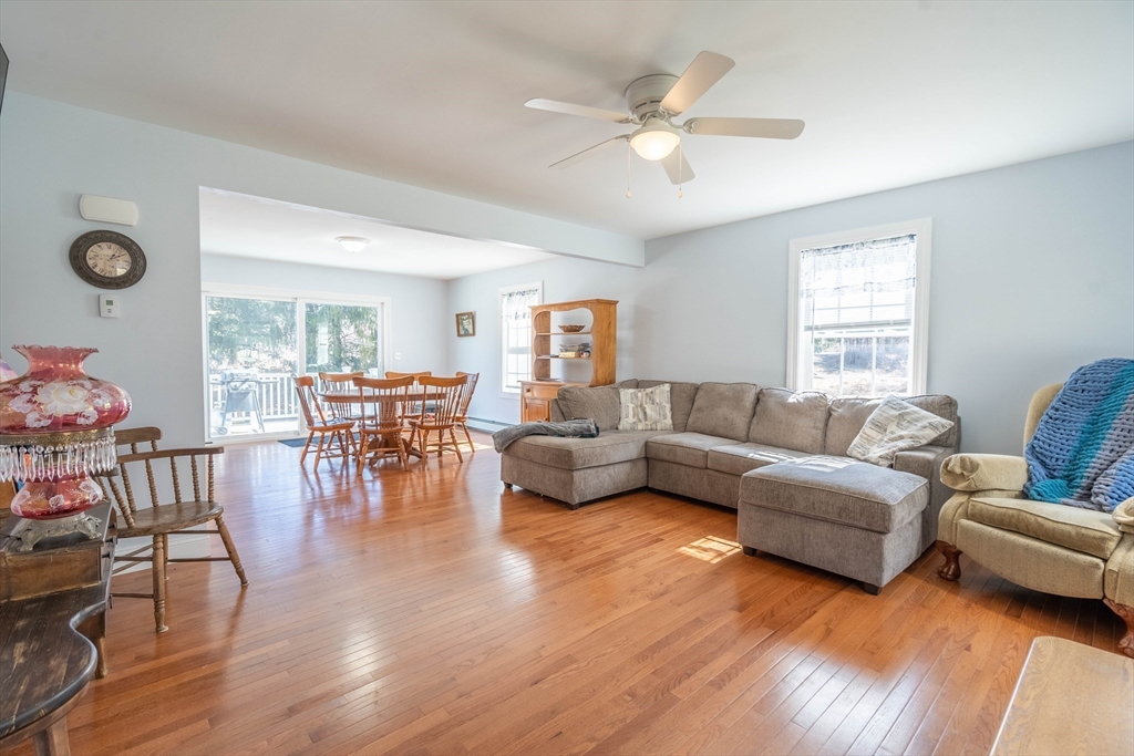 521 Brimfield Road Warren, MA 01083 - Photo 8 of 41 a living room with furniture and a large window