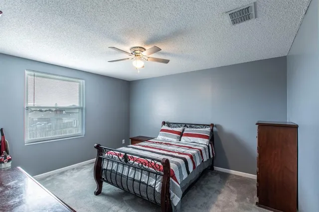 a view of hallway with wooden floor