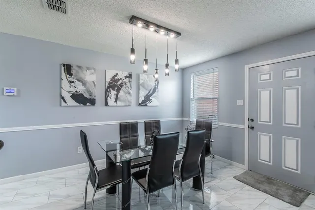 a kitchen with a stove and a microwave