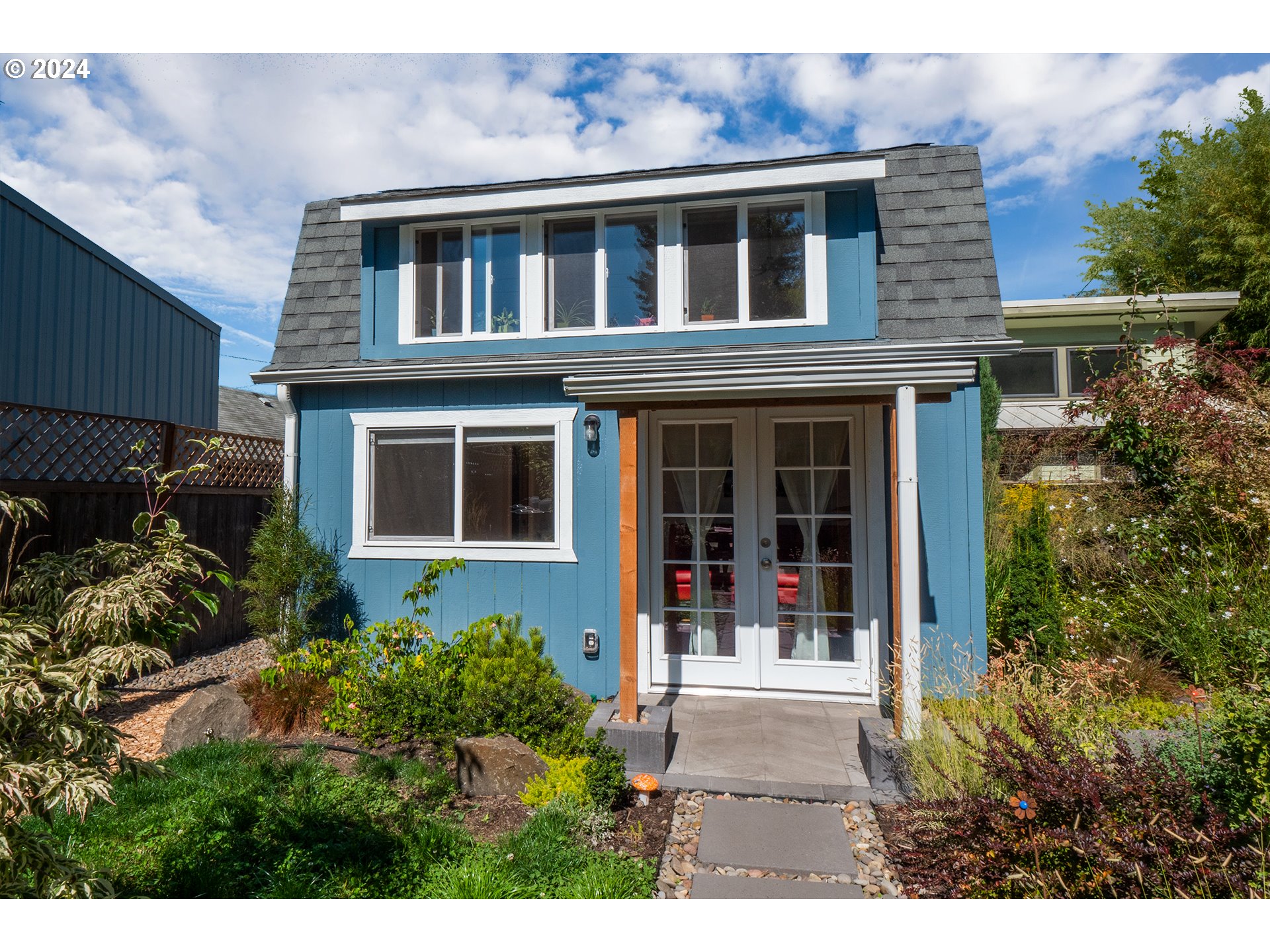 327 Clark Street Eugene, OR 97401 - Photo 20 of 42 a house view with a garden space