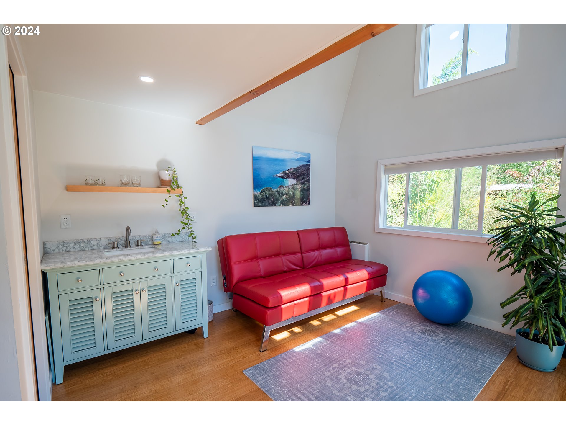 327 Clark Street Eugene, OR 97401 - Photo 22 of 42 a living room with furniture a potted plant and a large window