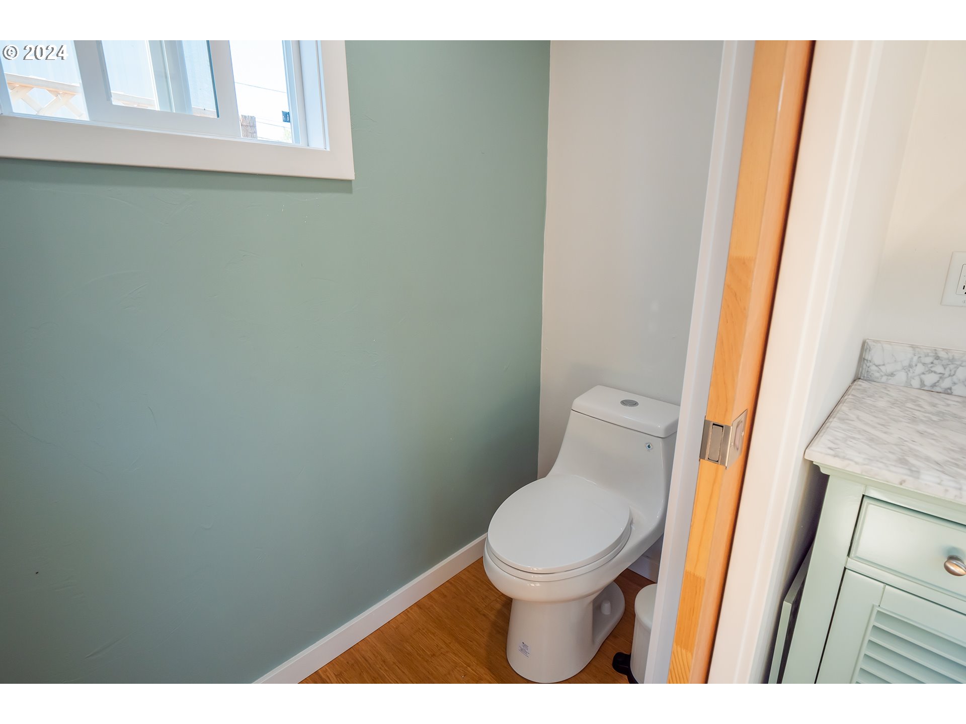 327 Clark Street Eugene, OR 97401 - Photo 26 of 42 a bathroom with a toilet and a sink