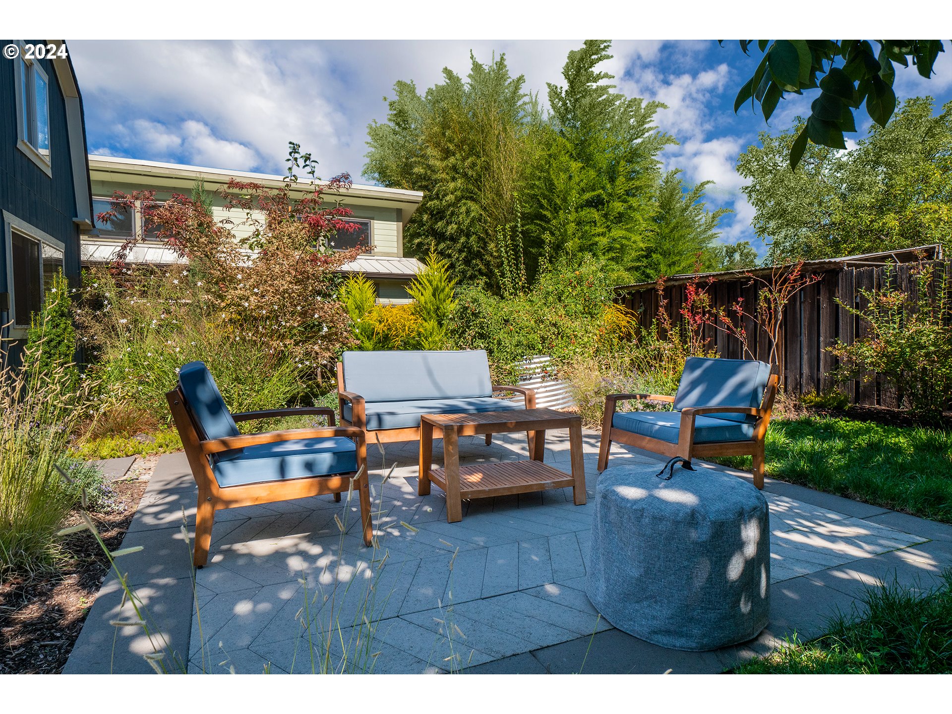 327 Clark Street Eugene, OR 97401 - Photo 27 of 42 a backyard of a house with table and chairs