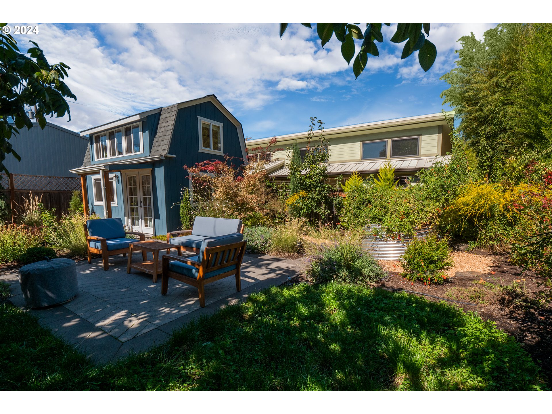 327 Clark Street Eugene, OR 97401 - Photo 28 of 42 a view of backyard with outdoor seating and plants