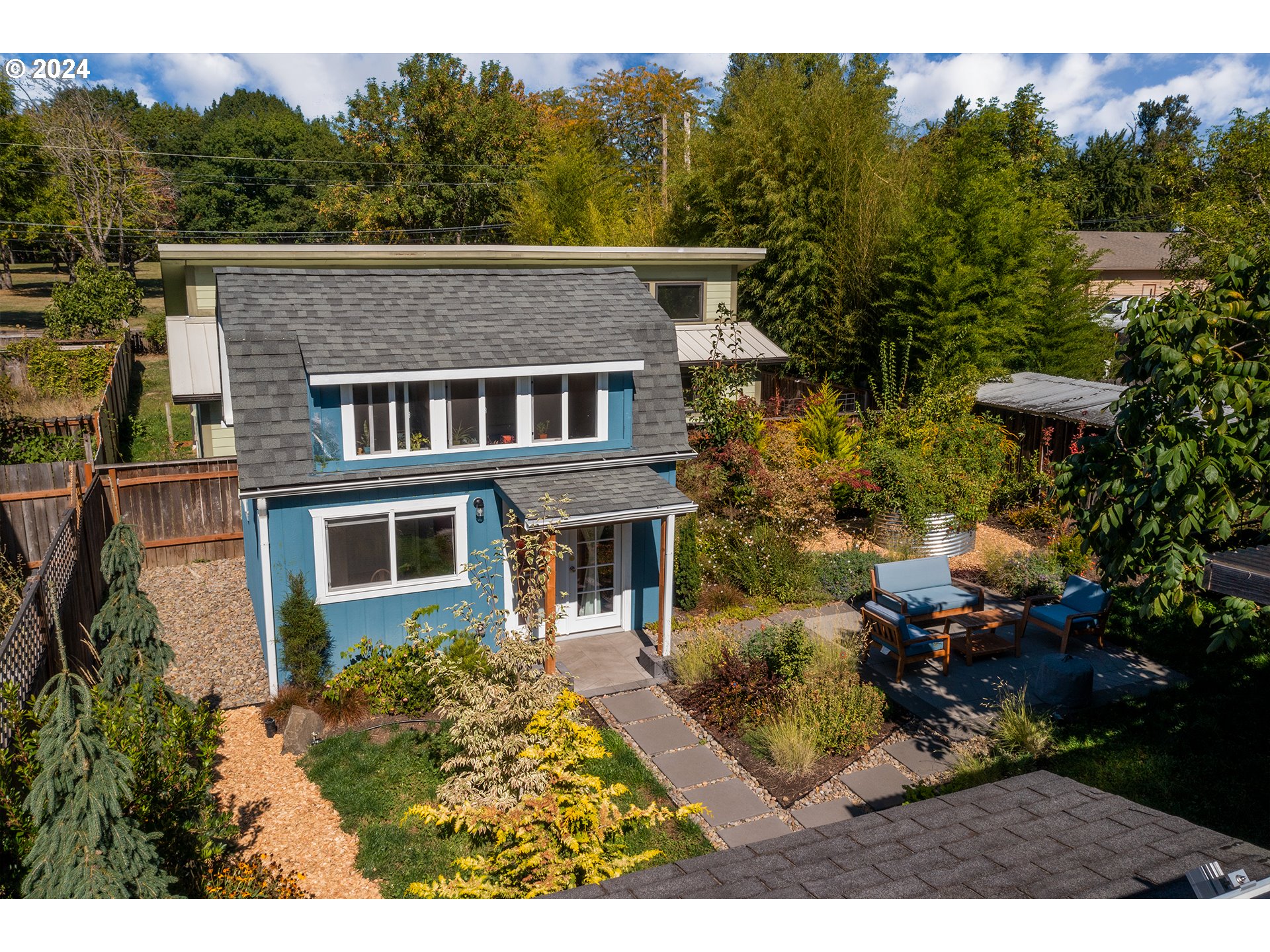 327 Clark Street Eugene, OR 97401 - Photo 30 of 42 a view of a house with a yard