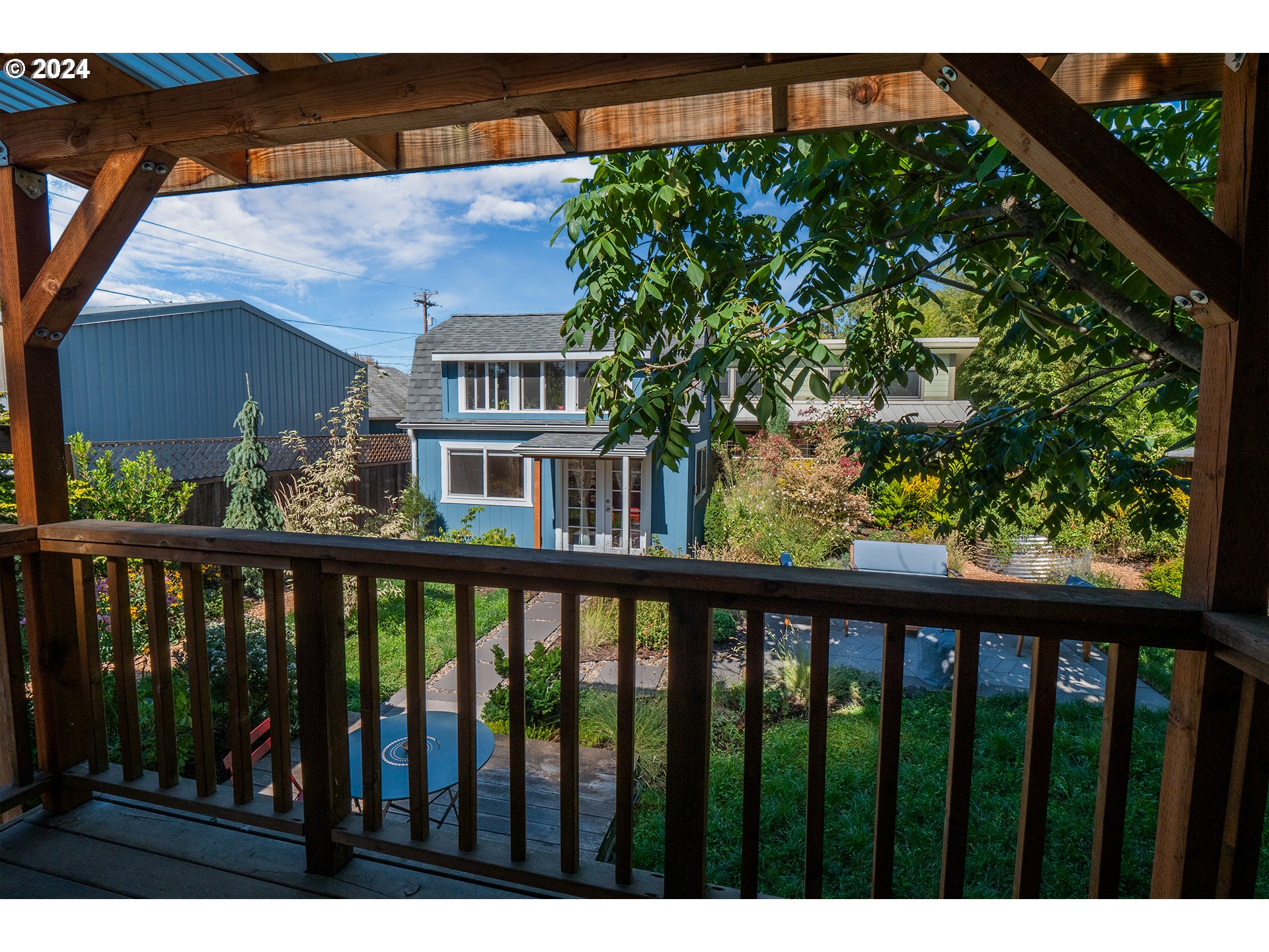 327 Clark Street Eugene, OR 97401 - Photo 31 of 42 a view of a brick house with a small yard