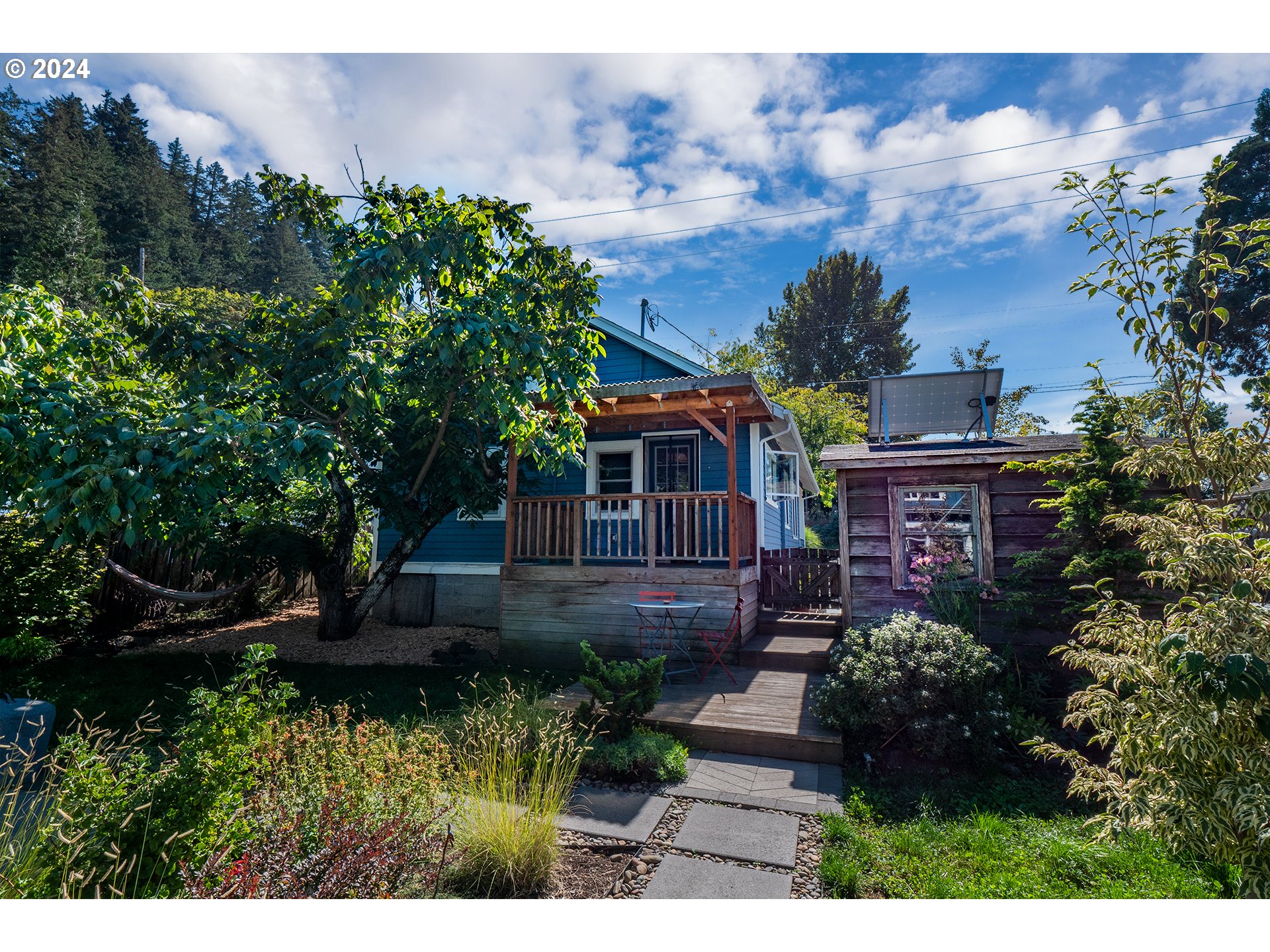 327 Clark Street Eugene, OR 97401 - Photo 33 of 42 a view of a house with a garden