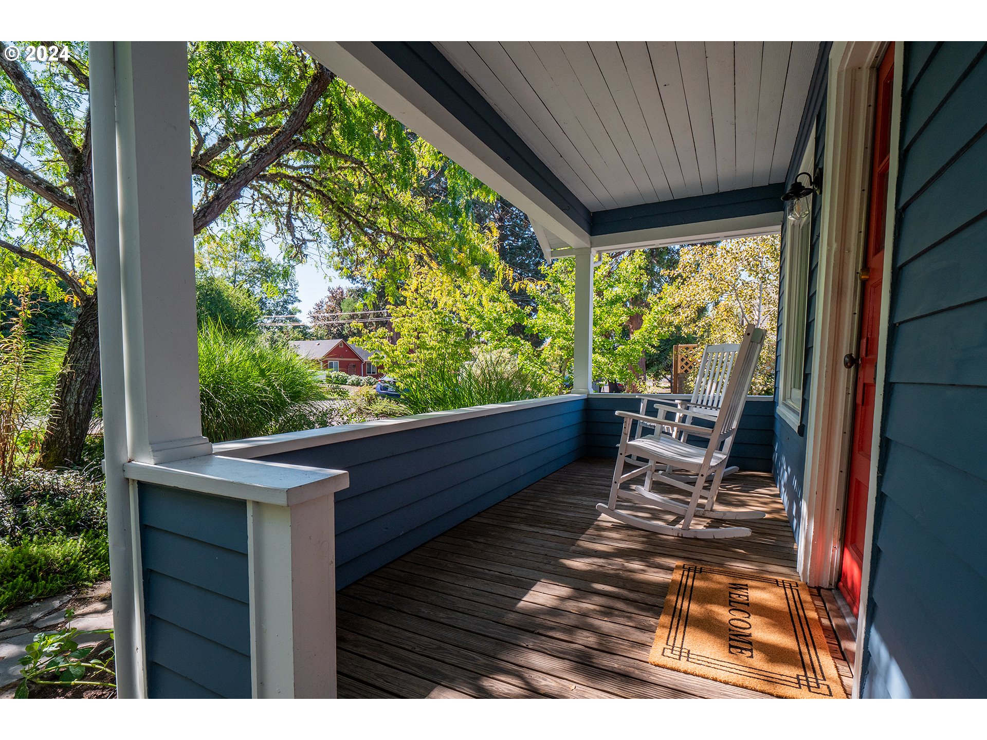 327 Clark Street Eugene, OR 97401 - Photo 36 of 42 a wooden bench sitting in front of a building