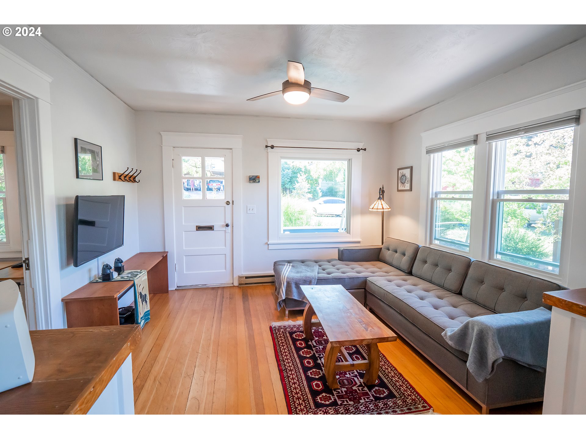 327 Clark Street Eugene, OR 97401 - Photo 4 of 42 a living room with furniture and a large window