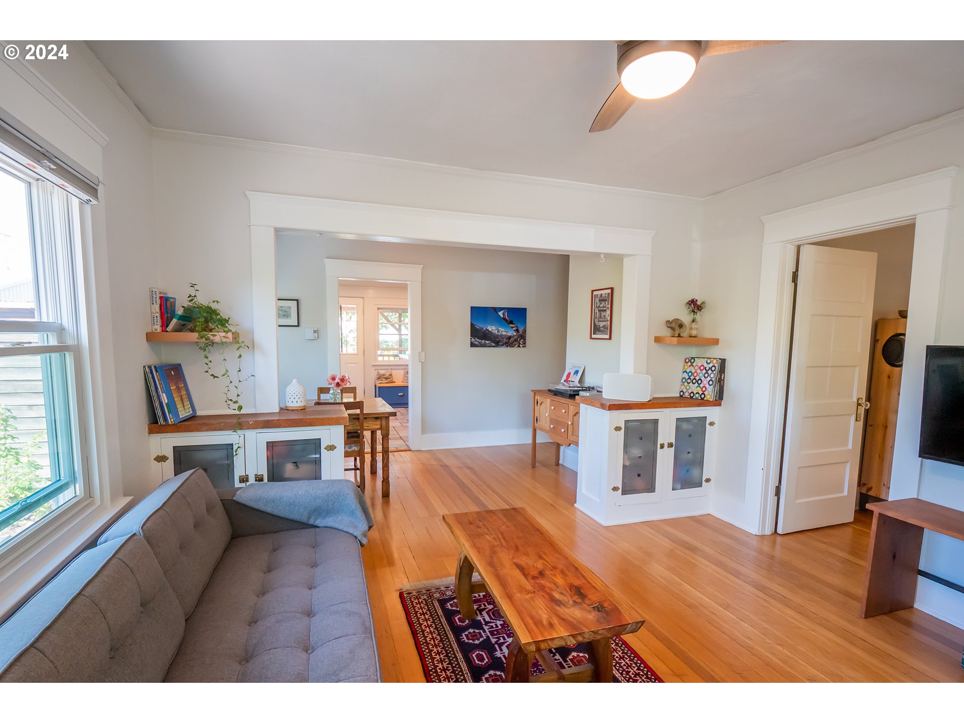 327 Clark Street Eugene, OR 97401 - Photo 5 of 42 a living room with furniture and a flat screen tv