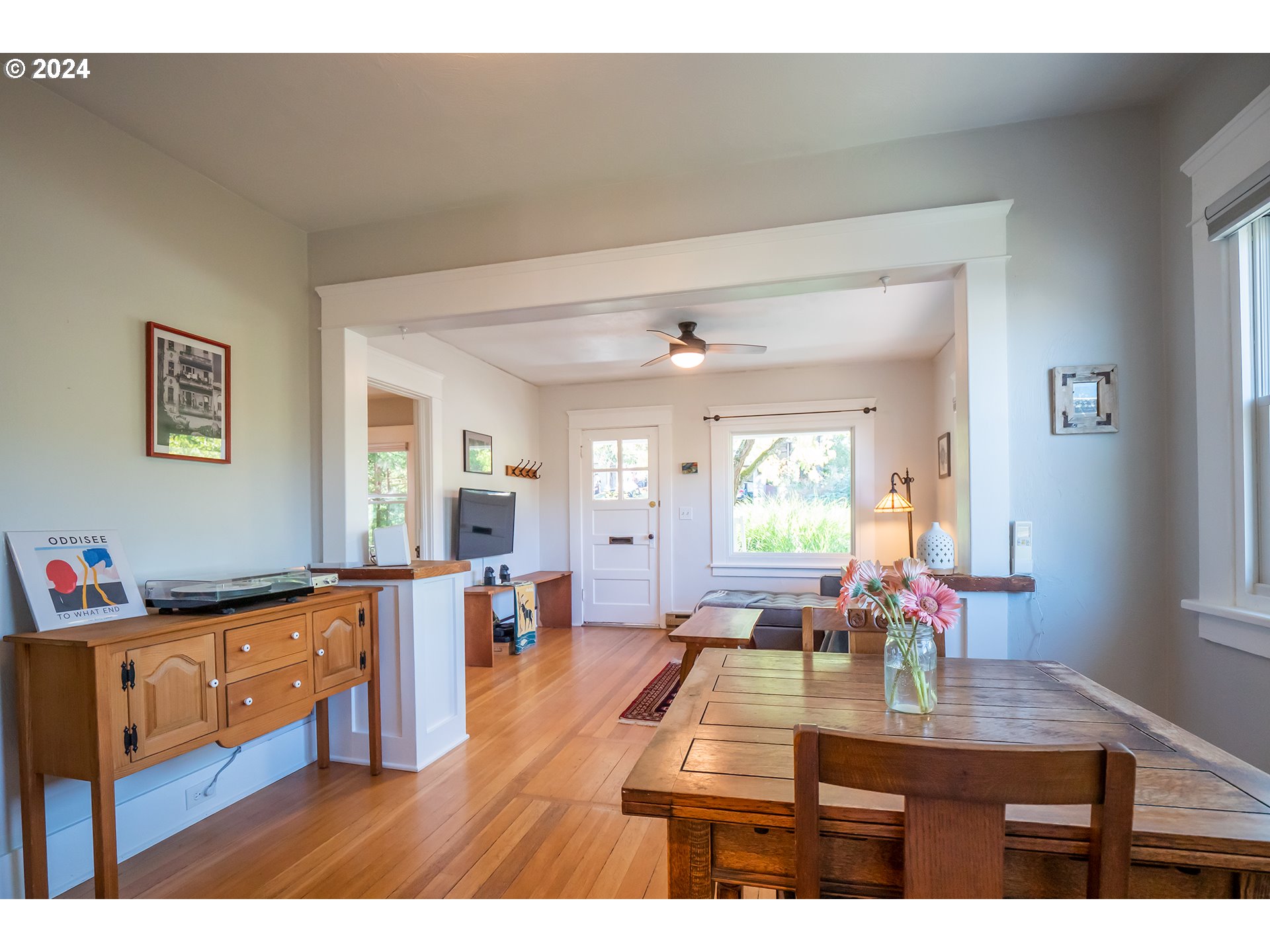327 Clark Street Eugene, OR 97401 - Photo 6 of 42 a living room with furniture and a wooden floor