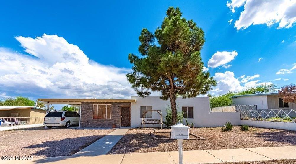1901 West Romany Road Tucson, AZ 85713 - Photo 2 of 37 a view of a house with a patio