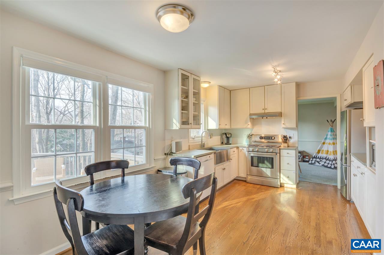 322 North Bennington Road Charlottesville, VA 22901 - Photo 11 of 39 a large kitchen with a table and chairs