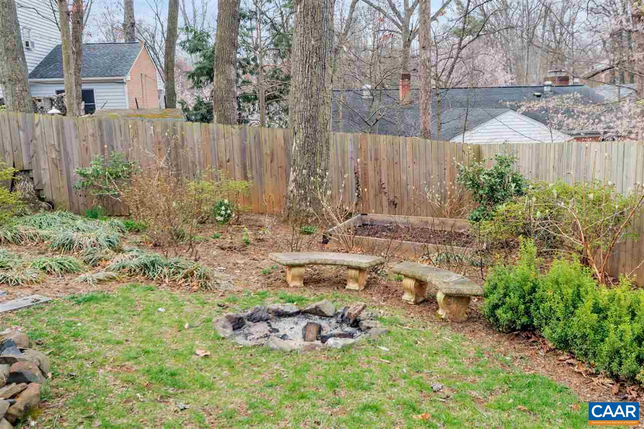 322 North Bennington Road Charlottesville, VA 22901 - Photo 17 of 39 a view of a backyard with plants and large trees