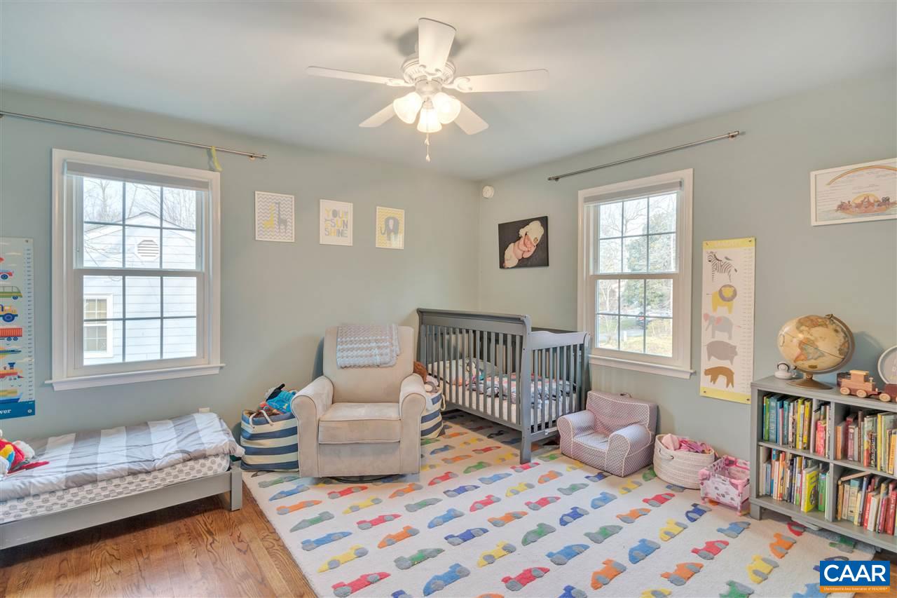 322 North Bennington Road Charlottesville, VA 22901 - Photo 26 of 39 a bedroom with furniture and a book shelf