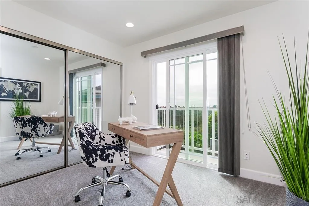 1790 Hawk View Drive Encinitas, CA 92024 - Photo 18 of 25 a dining room with furniture and large windows