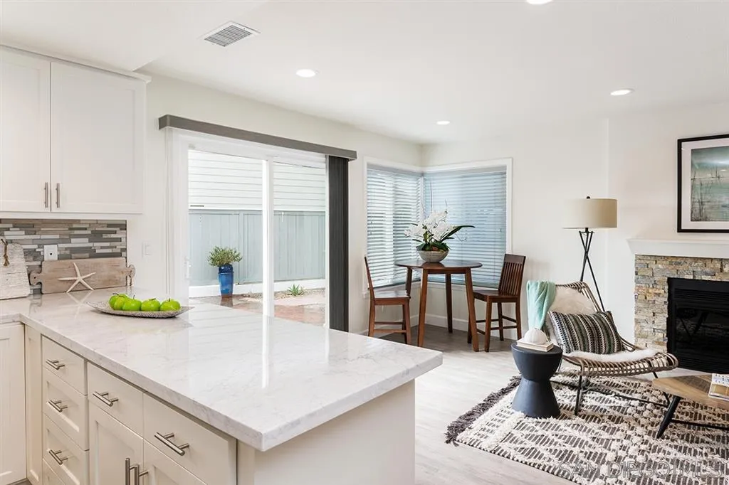 1790 Hawk View Drive Encinitas, CA 92024 - Photo 10 of 25 a kitchen with a sink a stove and a refrigerator