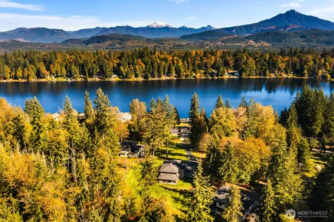 a view of a city with mountains in the background