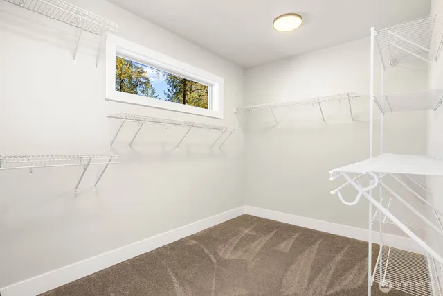 a view of a room with racks on the wall