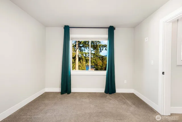 an empty room with window