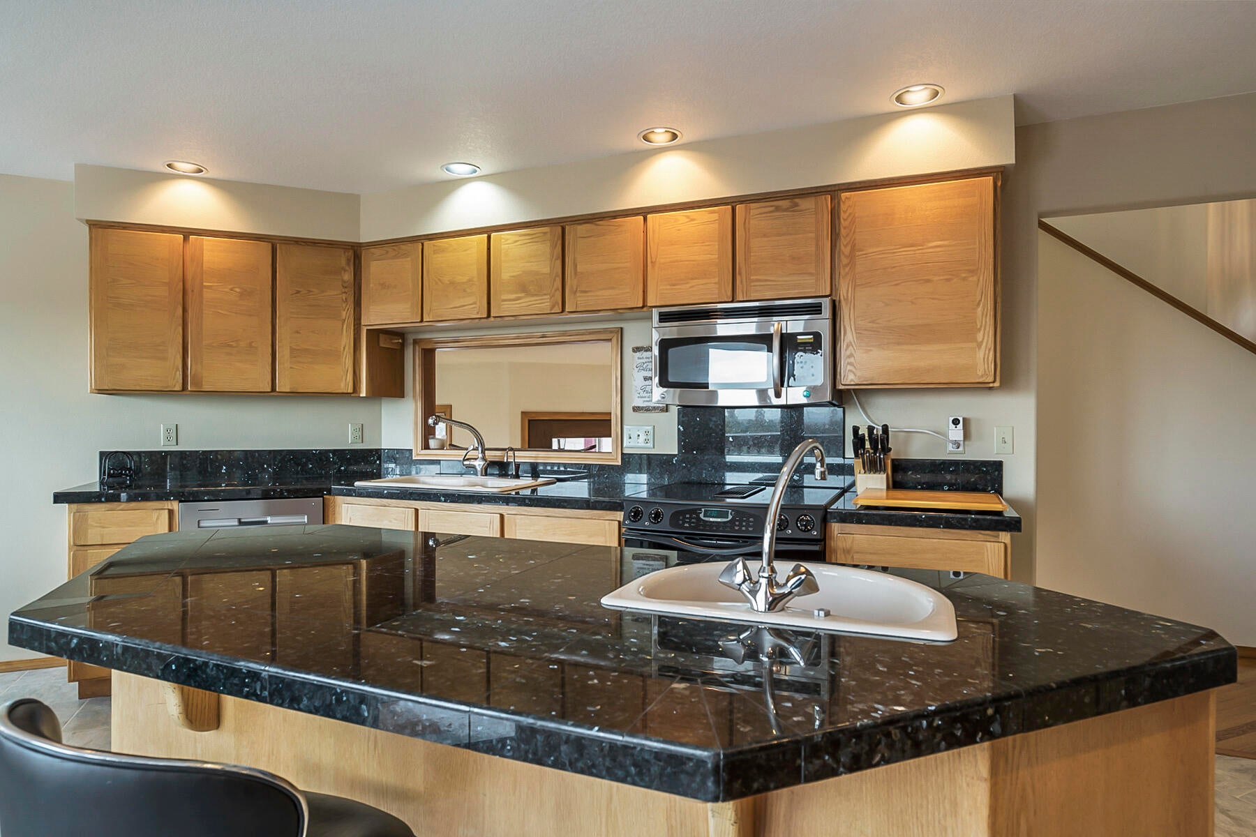 3808 Northwest Summerfield Road Bend, OR 97703 - Photo 20 of 38 Spacious island with overhand for extra bar seating.