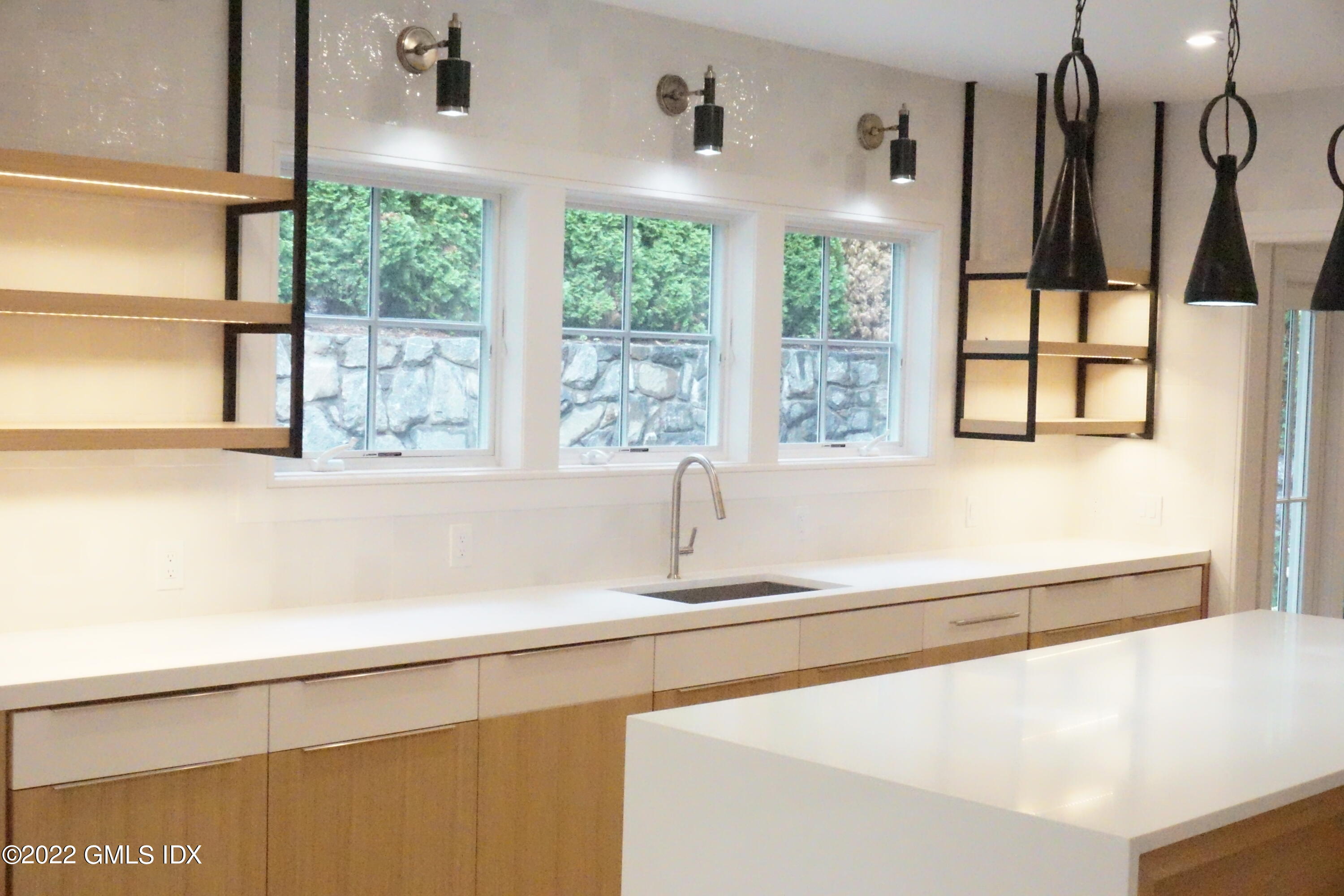 27 Skylark Road Greenwich, CT 06830 - Photo 5 of 25 a white bath tub sitting next to a window
