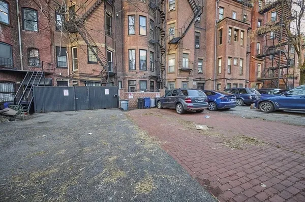 a cars parked on the side of street