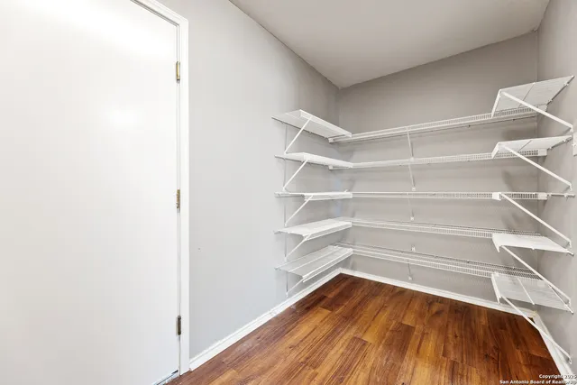 a view of storage and utility room with empty racks