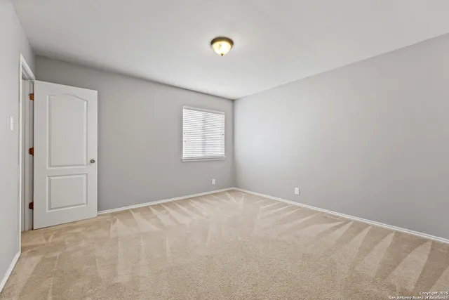 a bathroom with a sink toilet vanity and shower