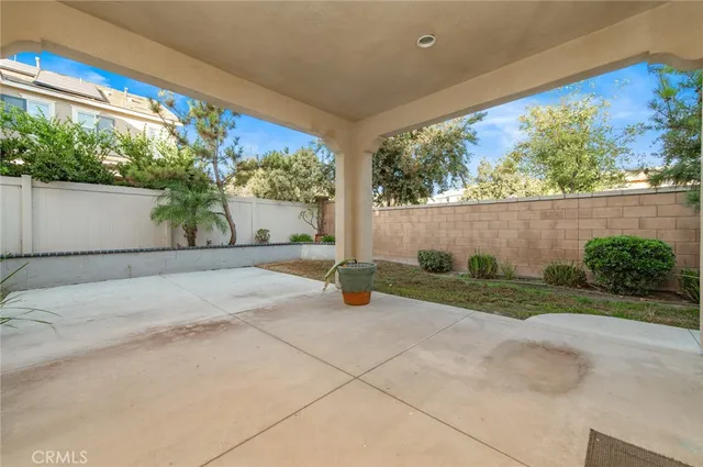 a view of a hallway with a living room