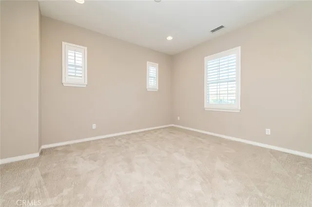 a bathroom with a sink a vanity and a mirror