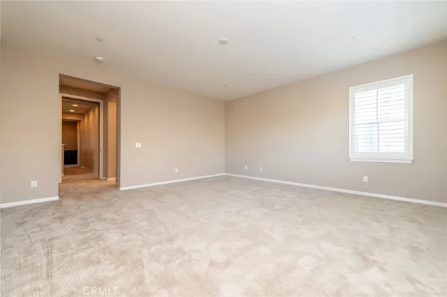 a spacious bathroom with a sink a large mirror and a bathtub