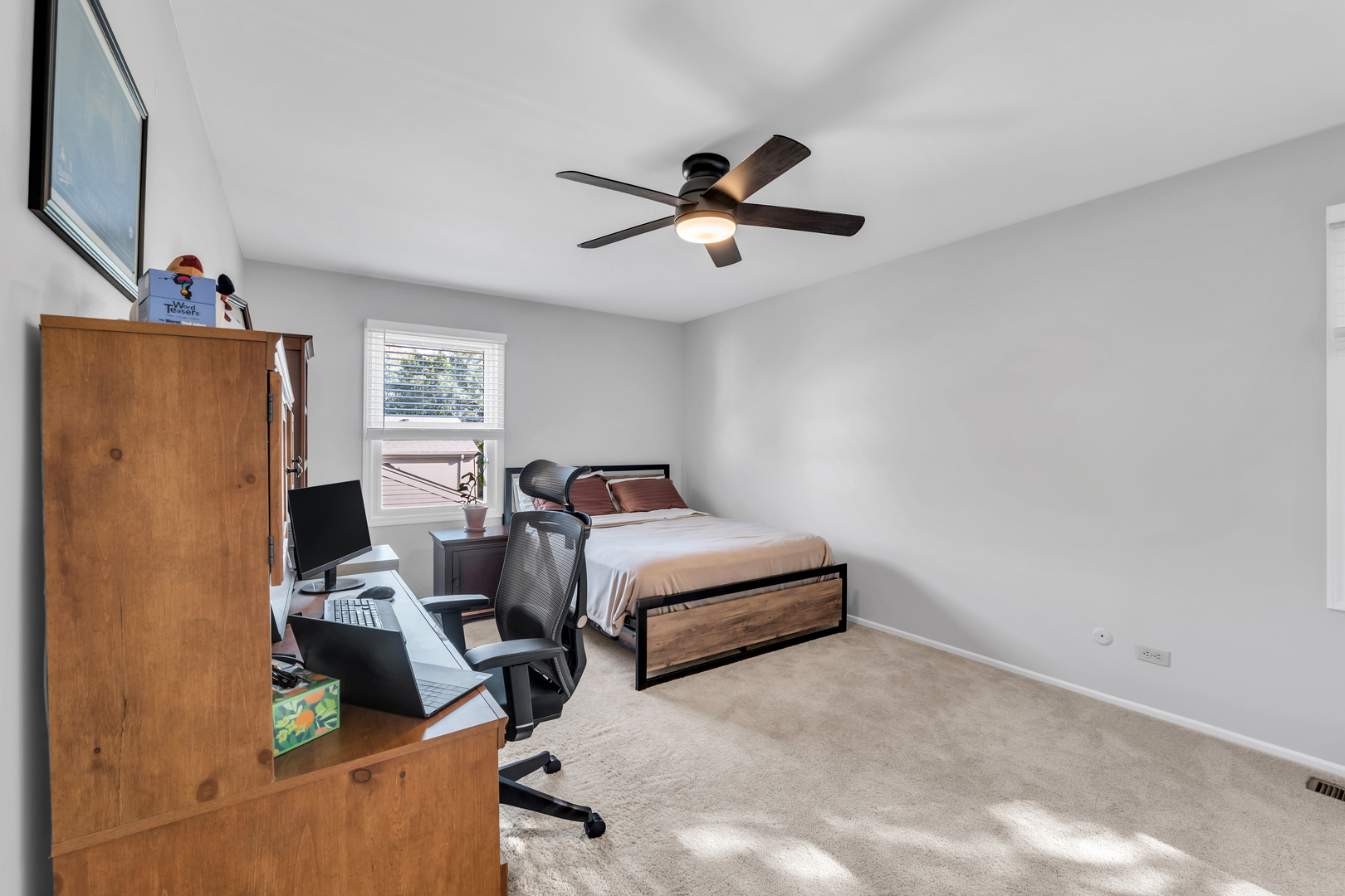 896 Chaucer Way Buffalo Grove, IL 60089 - Photo 21 of 26 a bedroom with a bed and a window