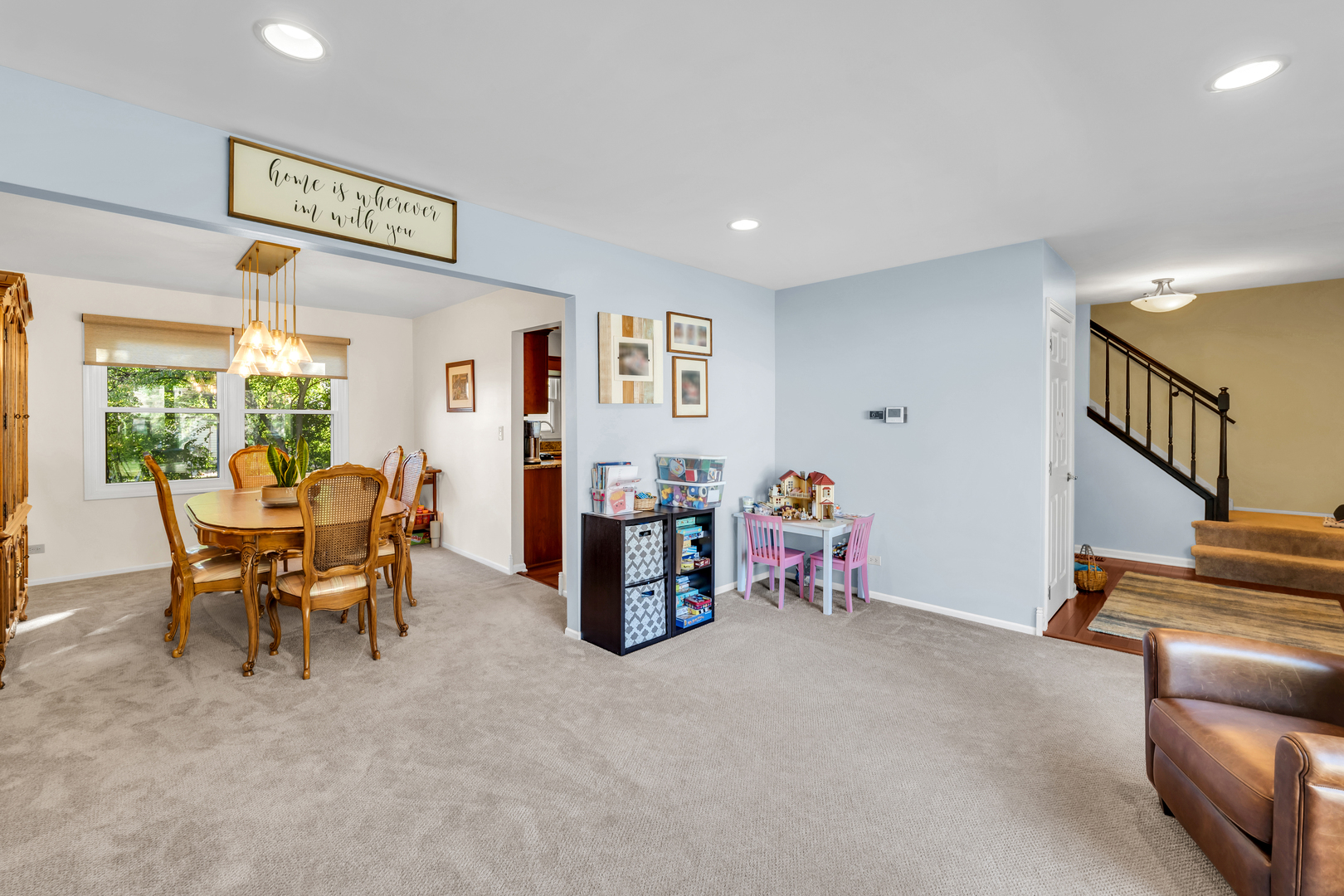 896 Chaucer Way Buffalo Grove, IL 60089 - Photo 6 of 26 a view of a livingroom with furniture and a window