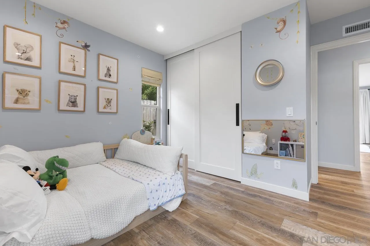 1521 Traske Road Encinitas, CA 92024 - Photo 14 of 23 a bed room with a bed and a window