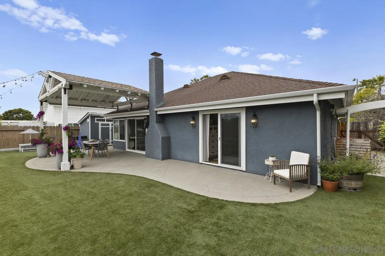 1521 Traske Road Encinitas, CA 92024 - Photo 18 of 23 a front view of a house with a garden and patio