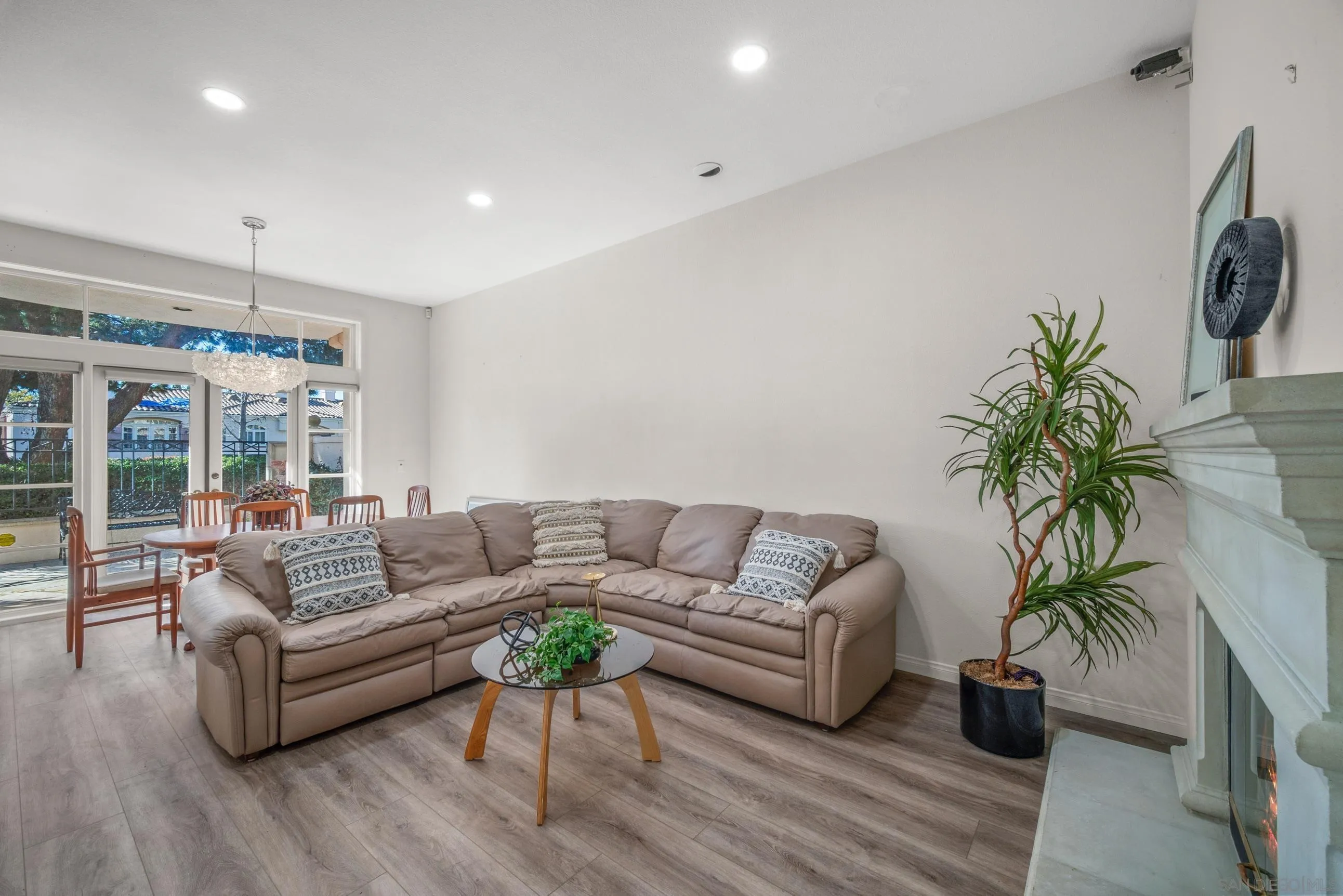 5380 Renaissance Avenue San Diego, CA 92122 - Photo 7 of 25 a living room with furniture and a large window