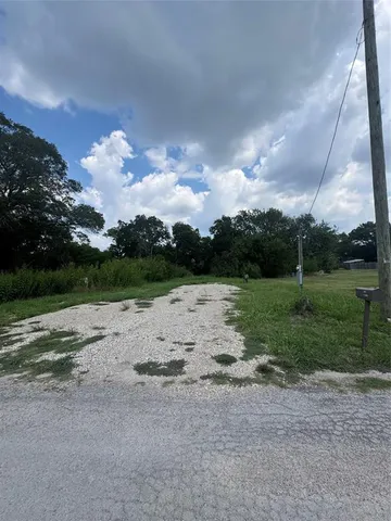 a view of a beach with a yard