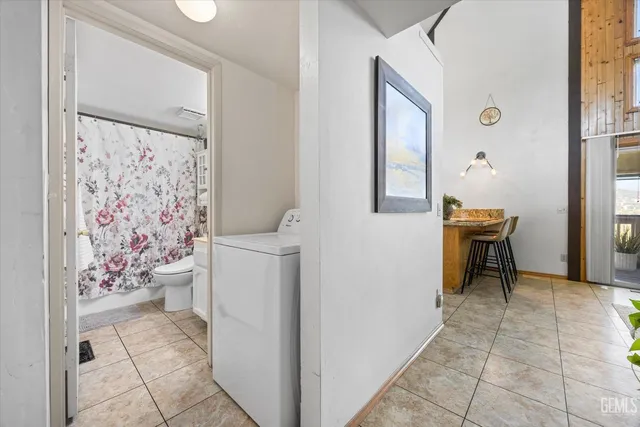 a view of a two chairs in the balcony