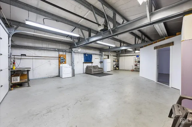 an empty room with furniture and closet