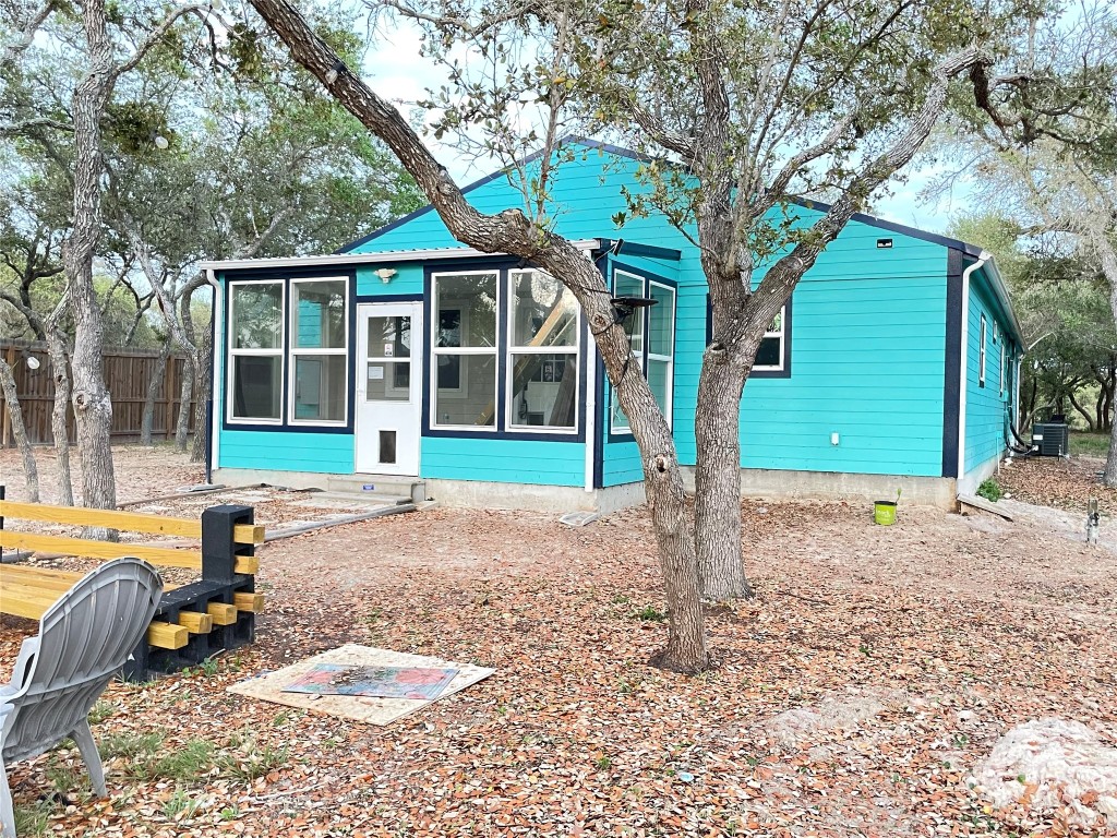 1016 Hardee Street Rockport, TX 78382 - Photo 1 of 14 a house with trees in the background