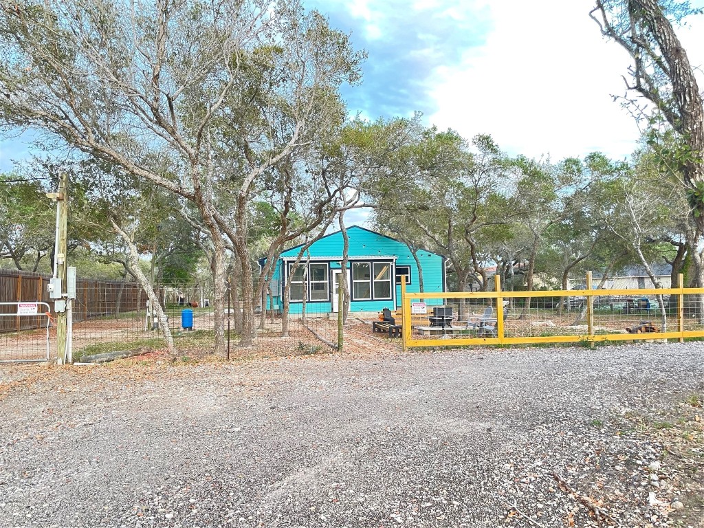 1016 Hardee Street Rockport, TX 78382 - Photo 4 of 14 a view of a house with a yard and sitting area