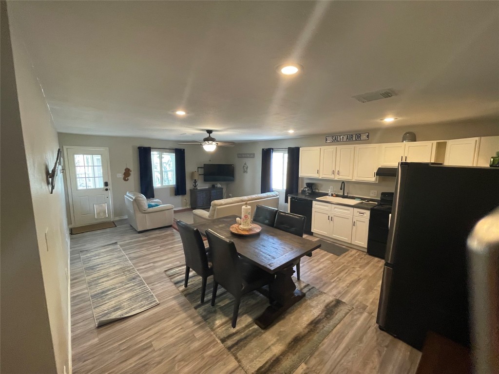 1016 Hardee Street Rockport, TX 78382 - Photo 10 of 14 a living room with lots of furniture and kitchen view