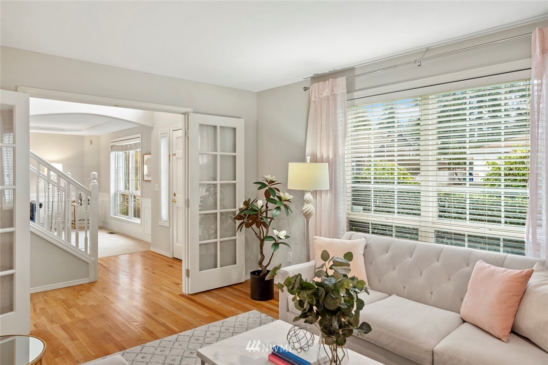 5112 Northeast 20th Street Renton, WA 98059 - Photo 19 of 40 a living room with furniture and a large window