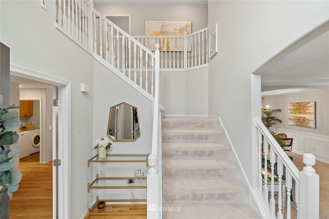 5112 Northeast 20th Street Renton, WA 98059 - Photo 2 of 40 a view of entryway and hall with wooden floor