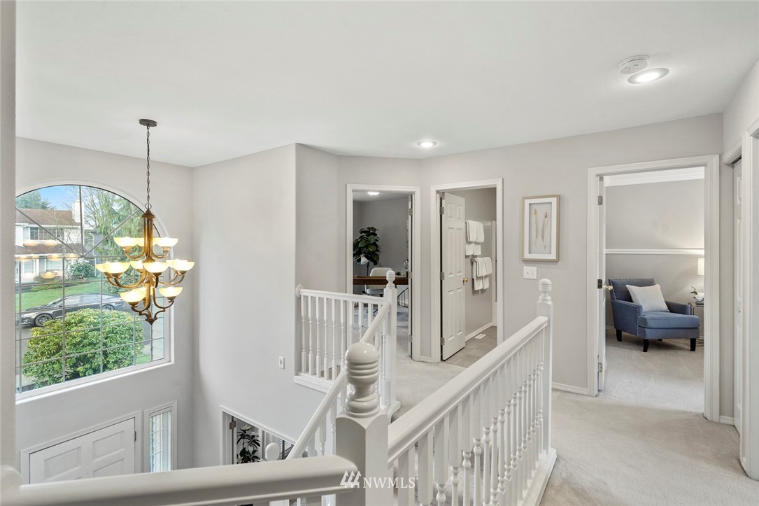 5112 Northeast 20th Street Renton, WA 98059 - Photo 23 of 40 a view of a hallway view with staircase