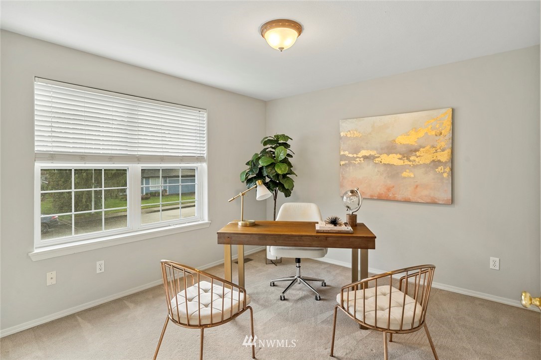 5112 Northeast 20th Street Renton, WA 98059 - Photo 24 of 40 a dining room with furniture and window