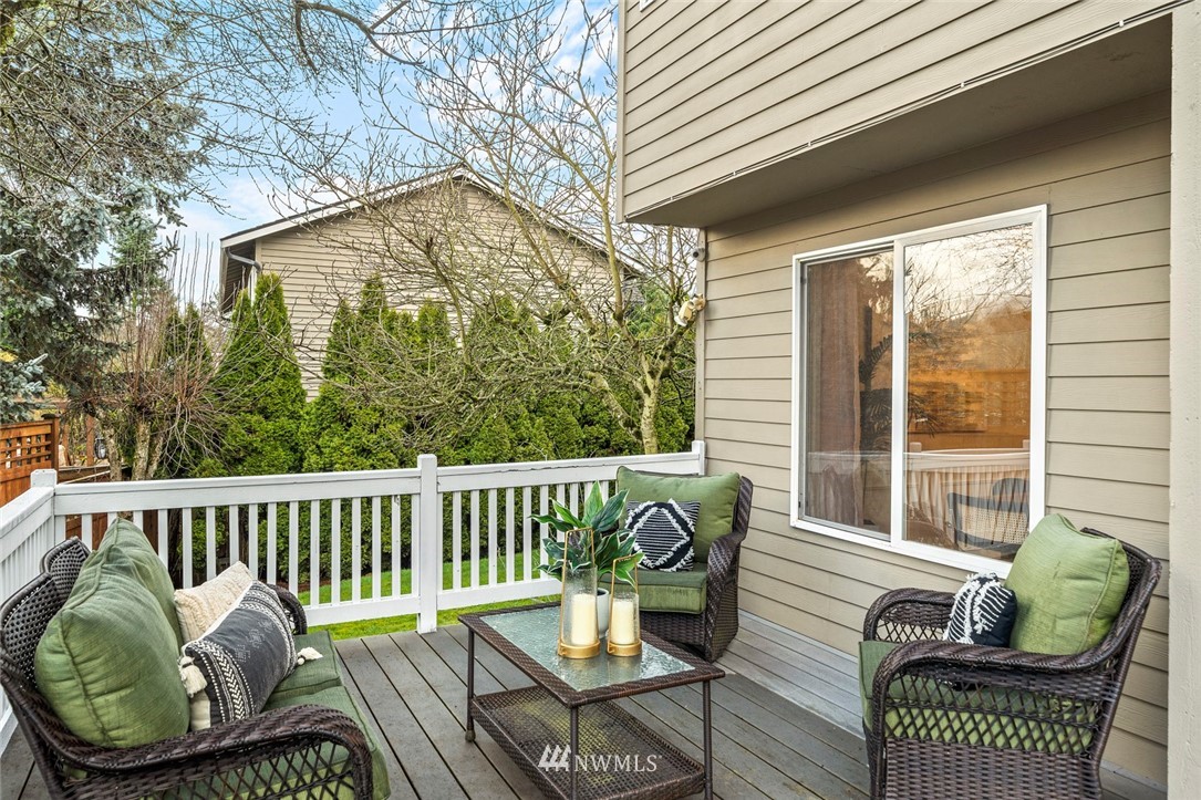 5112 Northeast 20th Street Renton, WA 98059 - Photo 34 of 40 a view of a chair in wooden deck