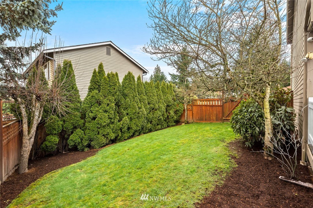 5112 Northeast 20th Street Renton, WA 98059 - Photo 36 of 40 a view of a back yard with green space