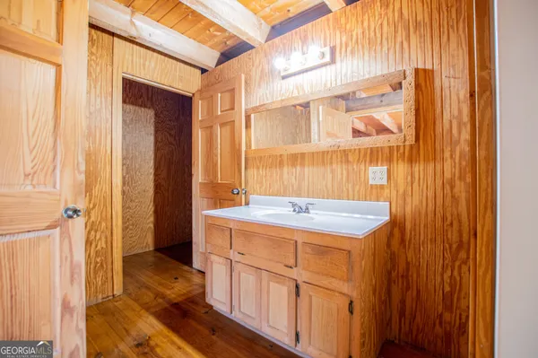 a bathroom with a bathtub and shower